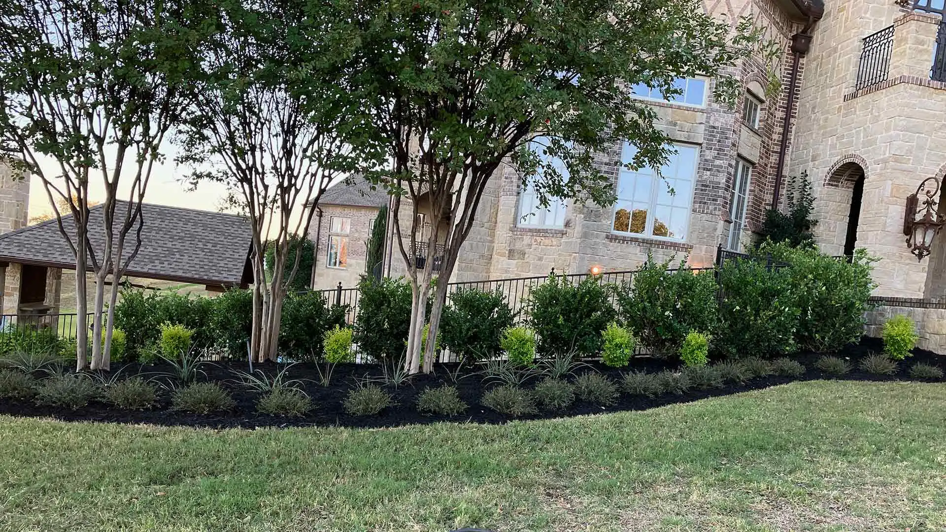 Enhanced curb appeal with a maintained landscape in Argyle, TX.